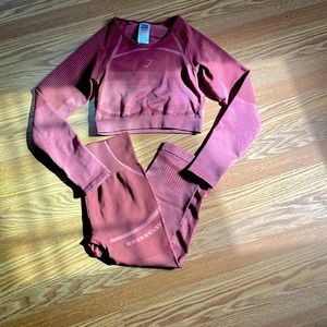 Red/purple gymshark two piece outfit.